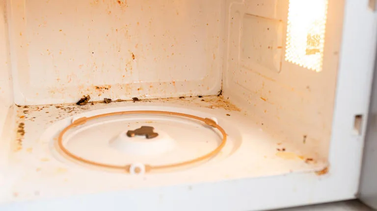 how to get yellow stain out of microwave