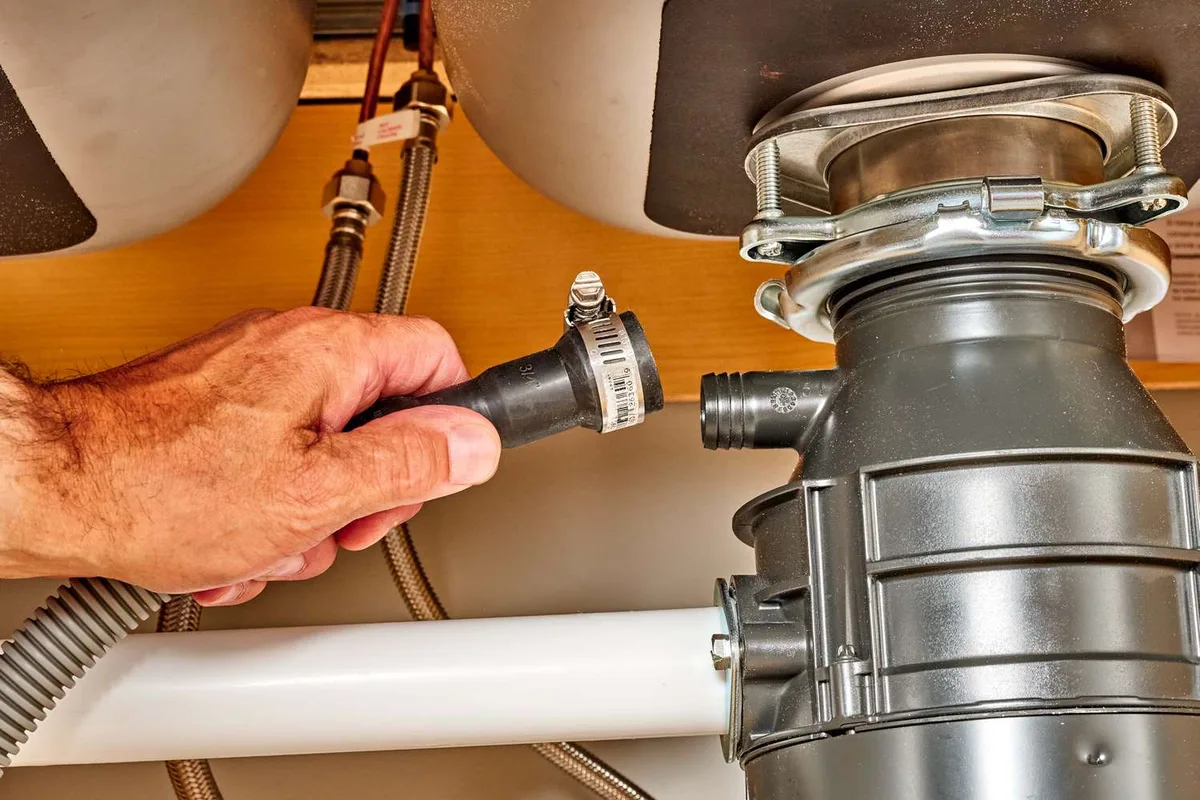 how to open dishwasher drain on garbage disposal