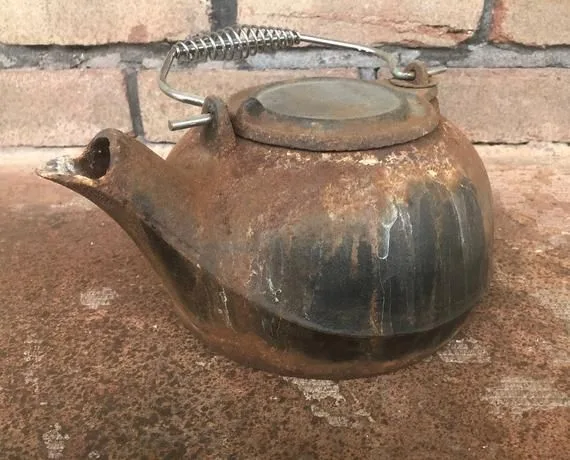 how to restore a rusty cast iron kettle