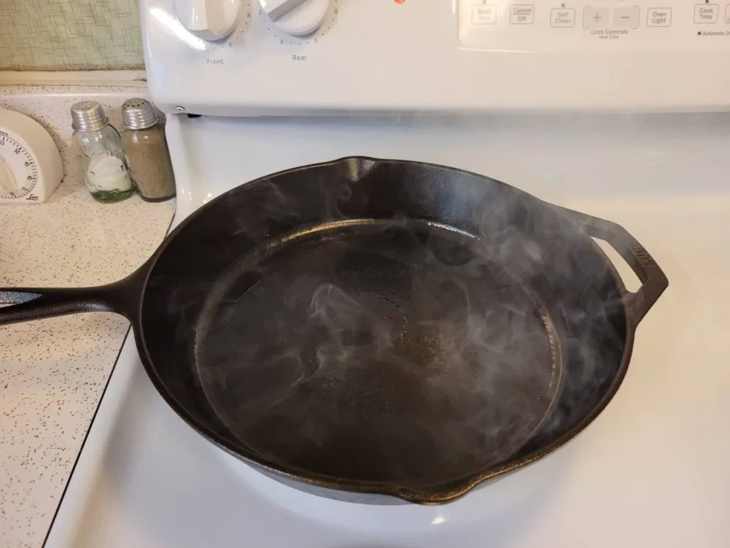 how to season cast iron without oven