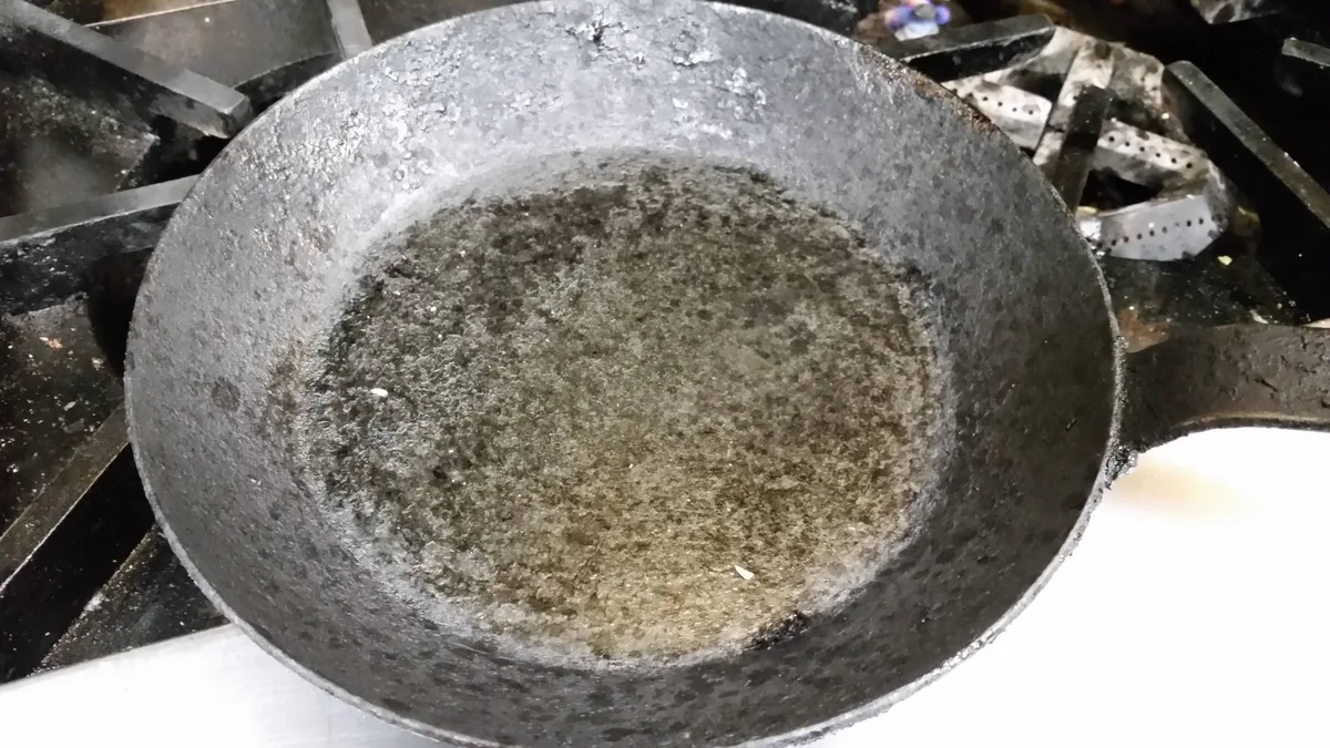 Original seasoning vs. carbon gunk